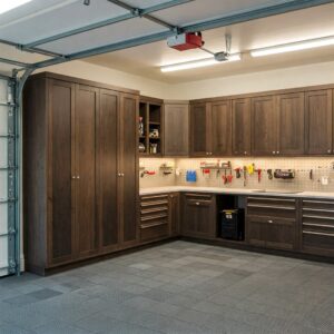 Classic new age garage cabinets with tall storage, under-cabinet lighting, and tool drawers.