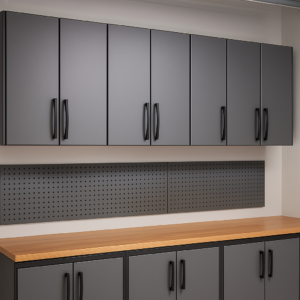 Wall-mounted garage cabinets paired with a tool pegboard and wood countertop, showcasing a practical and organized garage tool storage system.