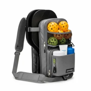 Pickleball racket holder with additional storage for balls and accessories.