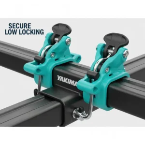 Close-up illustration of the secure locking mechanisms on a Yakima ski and snowboard rack.