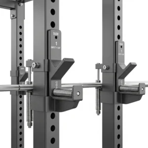 Detail shot of a half rack's adjustable J-cups and safety spotter arms, highlighting key features for secure weightlifting.