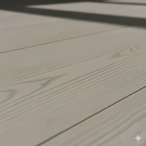 Detailed view of laminate flooring with a highly realistic wood-look photo layer and embossed texture.