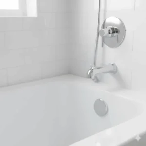 A perfectly clean and dry bathtub joint showing the best way to prepare a surface for new caulk.